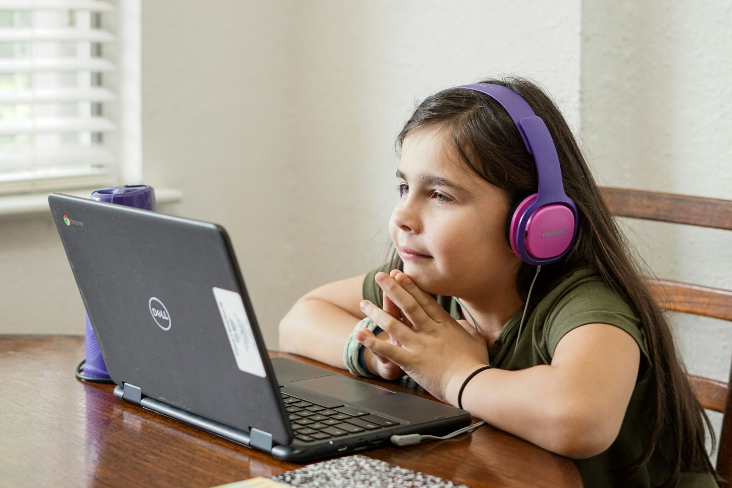 Girl taking quiz in online class